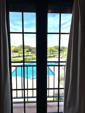 Interior - Pool View • Golf Apartment • GRA01 (Isla Canela)