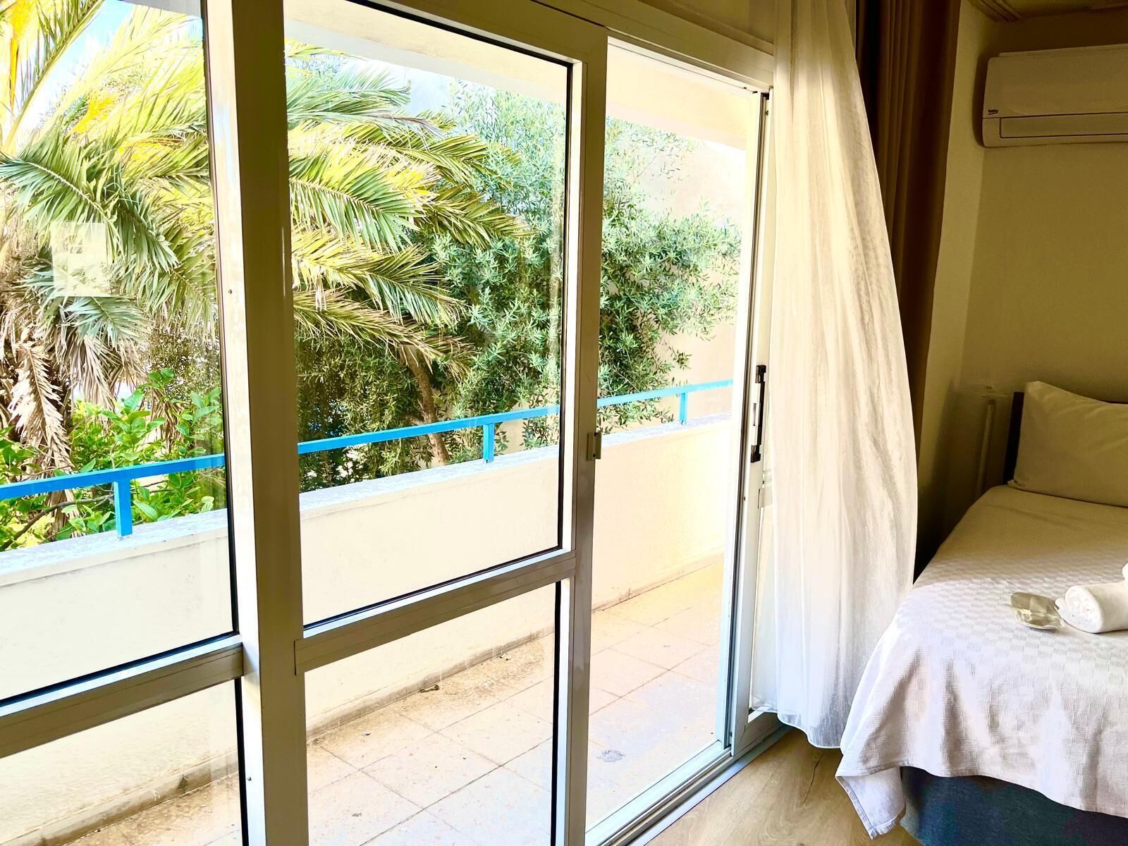 Kamar Quadruple, balkon, pemandangan kebun | Seprai premium dan Wi-Fi gratis