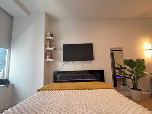1 bedroom, desk, iron/ironing board, WiFi -  Modern Studio with Chef’s Kitchen Bar, Dedicated Workspace & Home Theater (New York)