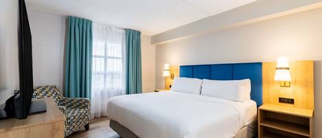 Tabla de planchar con plancha, wifi gratis y ropa de cama