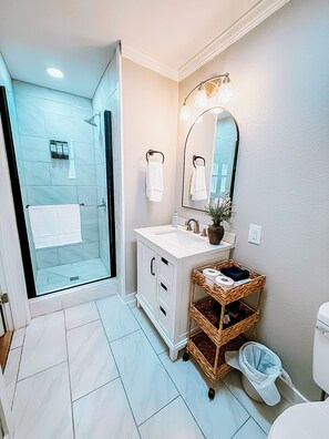 Shower, towels, soap, toilet paper