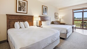 A hotel room with two beds, a large window, and a view of the outdoors. - Chula Vista Resort Studio Villa in Wisconsin Dells! Free Waterpark Passes! (Wisconsin Dells)