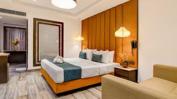 Executive Room | Premium bedding, minibar, in-room safe, desk