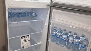 A refrigerator with multiple shelves, some containing water bottles and others empty. - 3 mins to Henday ,16 mins to WEM
1 cozy bedroom in a quite neighborhood.
No Pets (Edmonton)