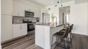 Fridge, dining tables - Landing | Incredible 2BD, Clubhouse (Austin)