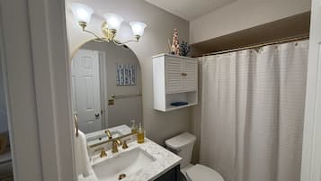 Hair dryer, towels, soap, toilet paper