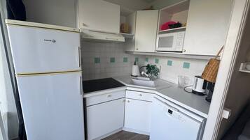 Fridge, microwave, coffee/tea maker, toaster