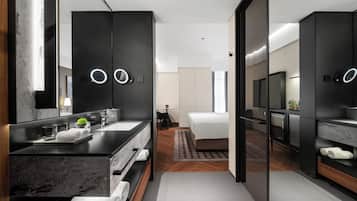 Premium bedding, down comforters, memory foam beds, free minibar