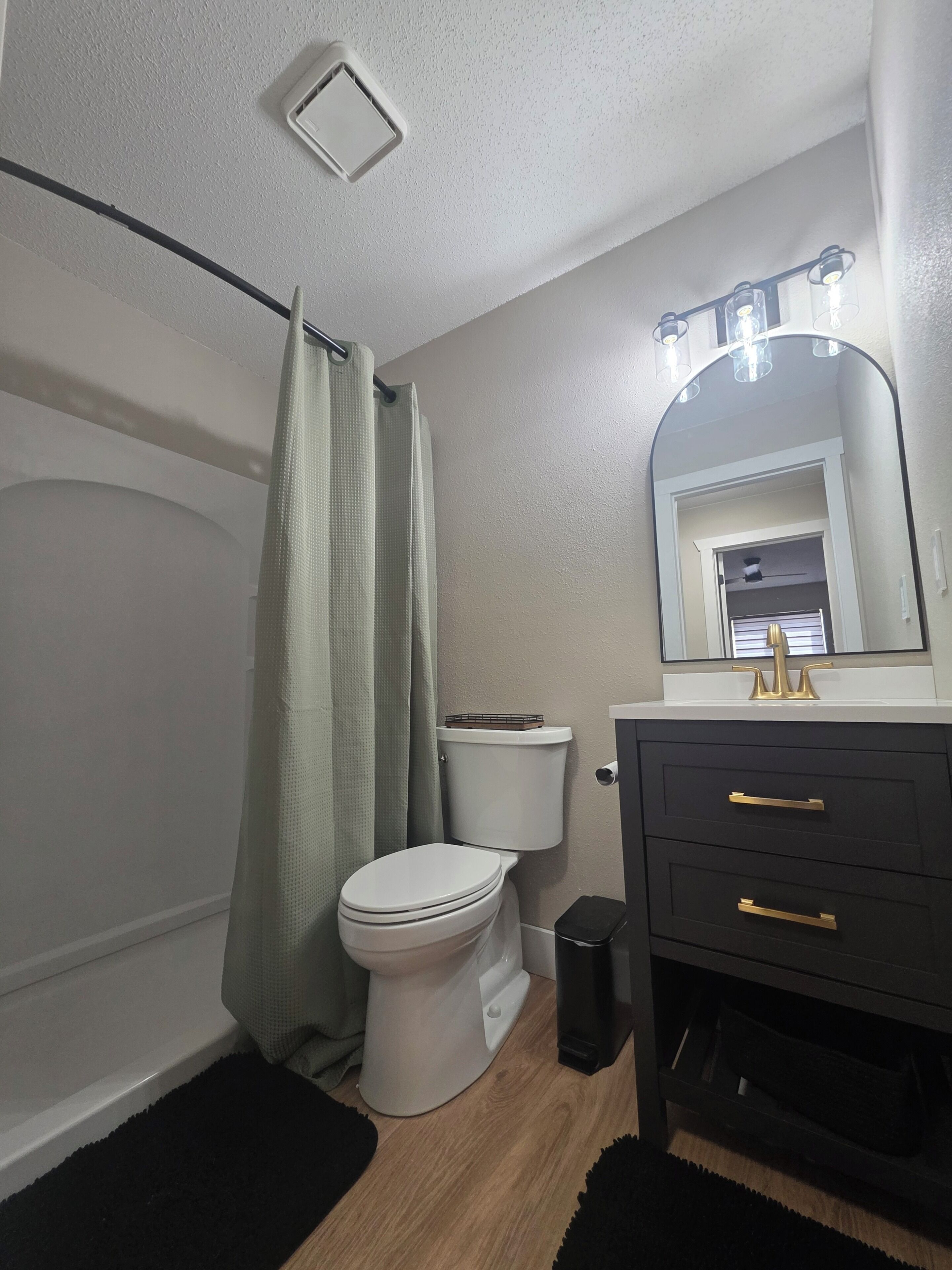 Shower, towels, soap, toilet paper