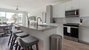 Fridge, dining tables - Landing | Stylish 2BD, Clubhouse, Gym (Jacksonville)