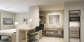 A hotel room with a bed, desk, chair, vanity with mirror, and a TV mounted on the wall. - Homewood Suites By Hilton Shreveport South (Shreveport)
