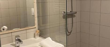 Shower, towels, soap, shampoo