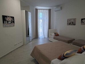 Apartment, Balcony, Partial Sea View | Blackout drapes, iron/ironing board, free WiFi - Seascape Apartment (Civitavecchia)