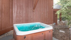 A hot tub with steps, wooden deck, and a wooden fence. - 796a Potato Patch - 4BD Private Home in Vail (Vail)
