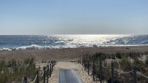 A beach pathway leading to the ocean with a clear sky. - Bayside Resort Escape: 5BR Coastal Home -Golf, Pools, Restaurants & Beach Access (Selbyville)