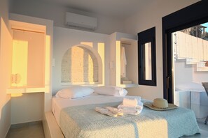 Apartamento, vista para o mar | Cofres nos quartos, cortinas blackout, quartos à prova de som