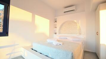 Apartment, Sea View | In-room safe, blackout drapes, soundproofing, iron/ironing board