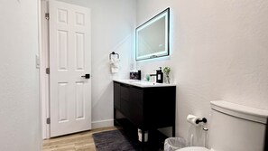 Hair dryer, towels, soap, toilet paper