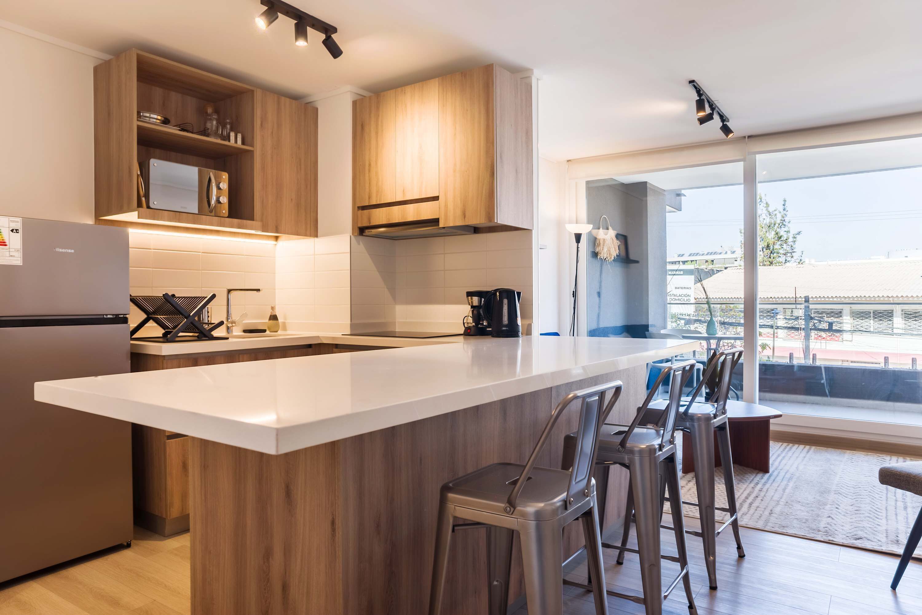 Fridge, microwave, stovetop, coffee/tea maker