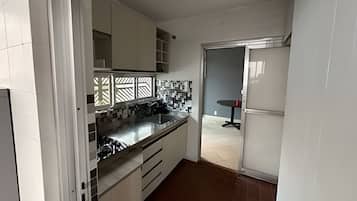 Chambre Simple | Cuisine privée
