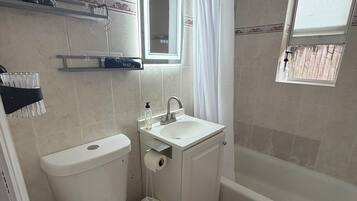 Hair dryer, towels, soap, toilet paper