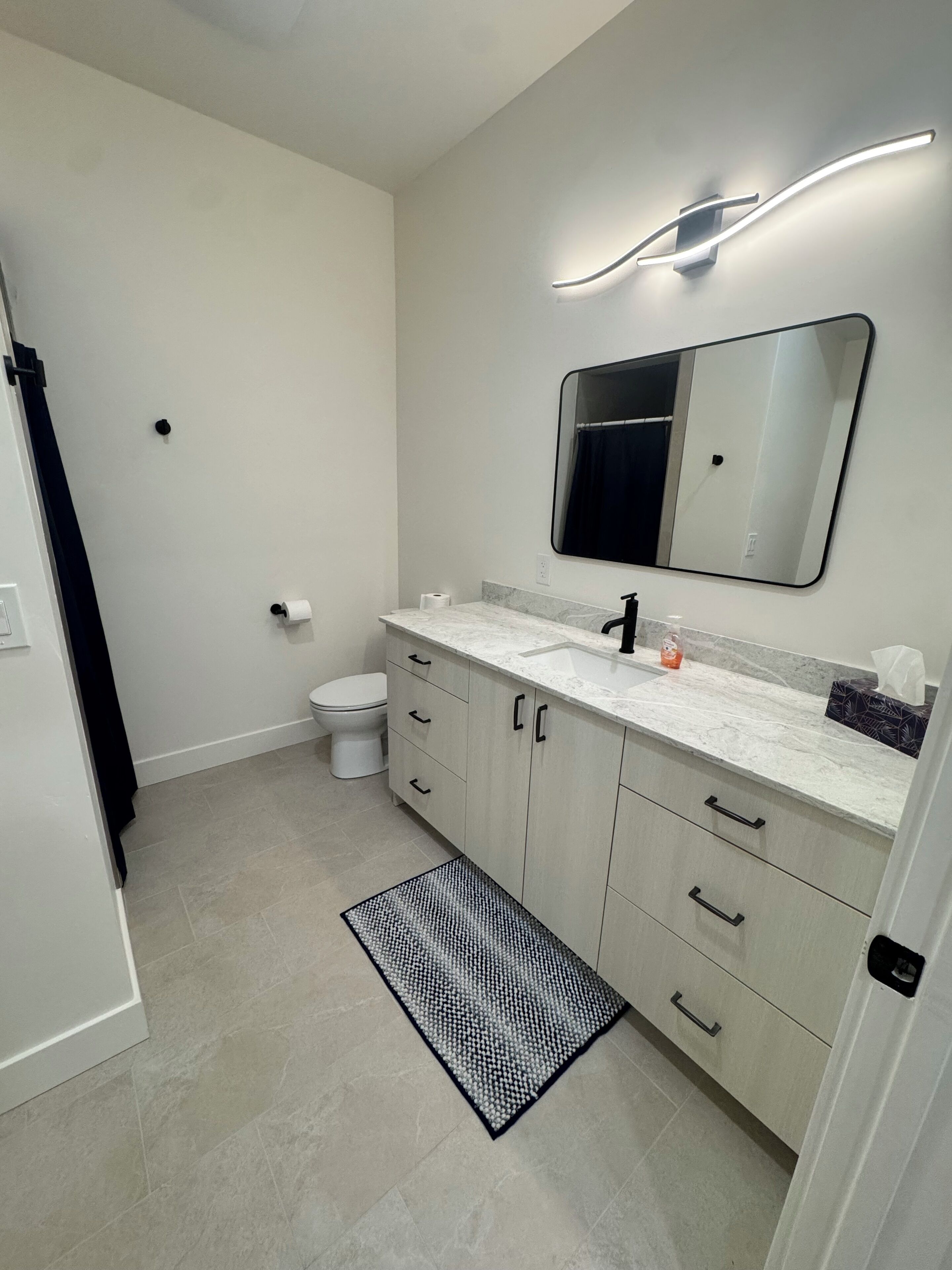 Shower, towels, soap, toilet paper