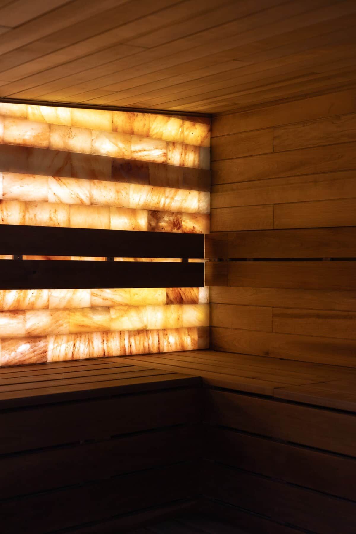 A sauna with wooden walls and benches.