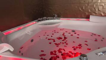 Jetted bath, hair dryer, towels, soap