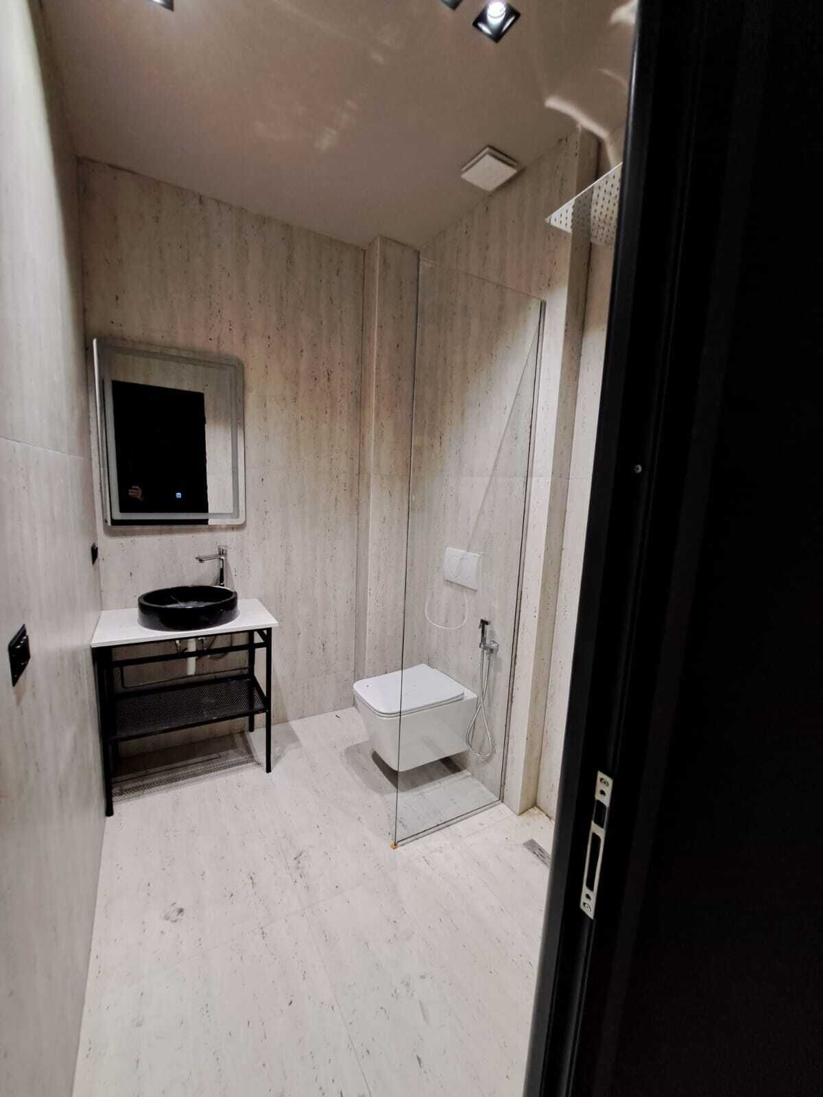 Suite Junior, vista città | Bagno | Set di cortesia gratuito, asciugacapelli, pantofole, asciugamani