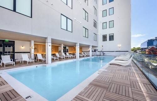 A modern-industrial one bedroom condo with views of the Nashville cityscape.