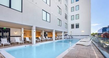 A modern-industrial one bedroom condo with views of the Nashville cityscape.