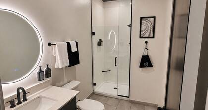 A modern-industrial one bedroom condo with views of the Nashville cityscape.