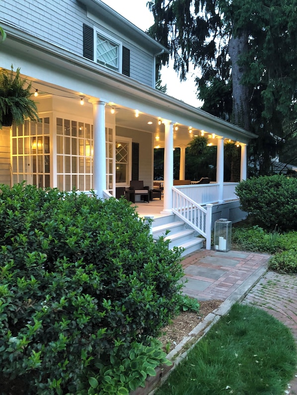 A house with a porch, steps, and a garden. - Distinctive 4-Bed 4.5 Bath Victorian Home in Beautiful Summit NJ. Fully Updated. (Summit)