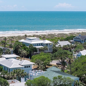 A coastal residential area with houses, a beach, and a clear view of the ocean. - Private Pool + Rooftop Ocean Views (Isle Of Palms)