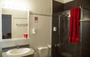 A bathroom with a sink, toilet, and shower. - El Pacha Suites Sharm Sanafir Hotel (Sharm El Sheikh)
