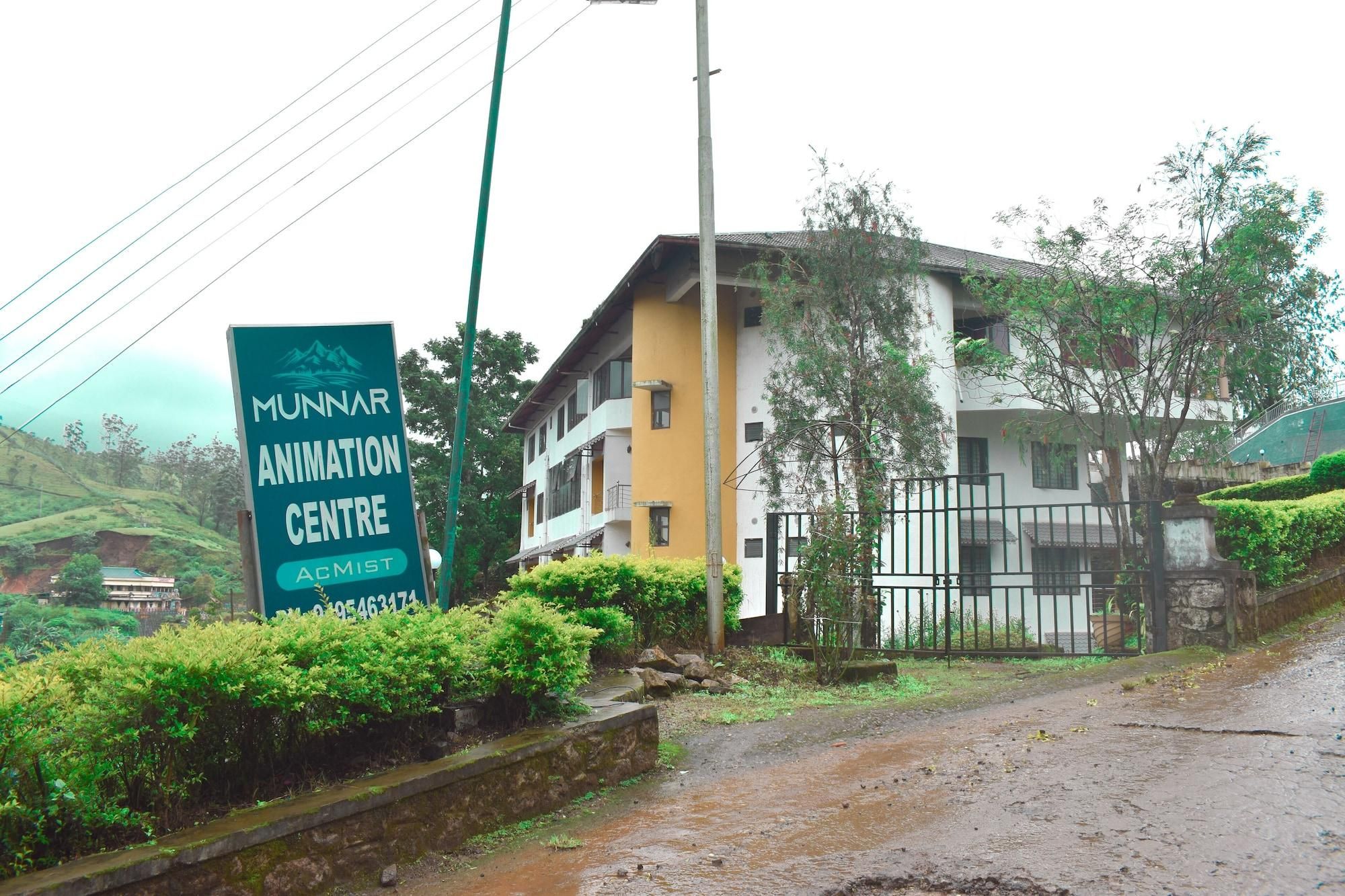 Un edificio con un cartel que indica Munnar Animation Centre.