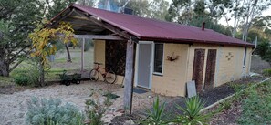 Exterior - Mudbrick self contained studio with wood heater (Mandurang South)