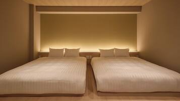 Premium bedding, blackout drapes, free WiFi, bed sheets