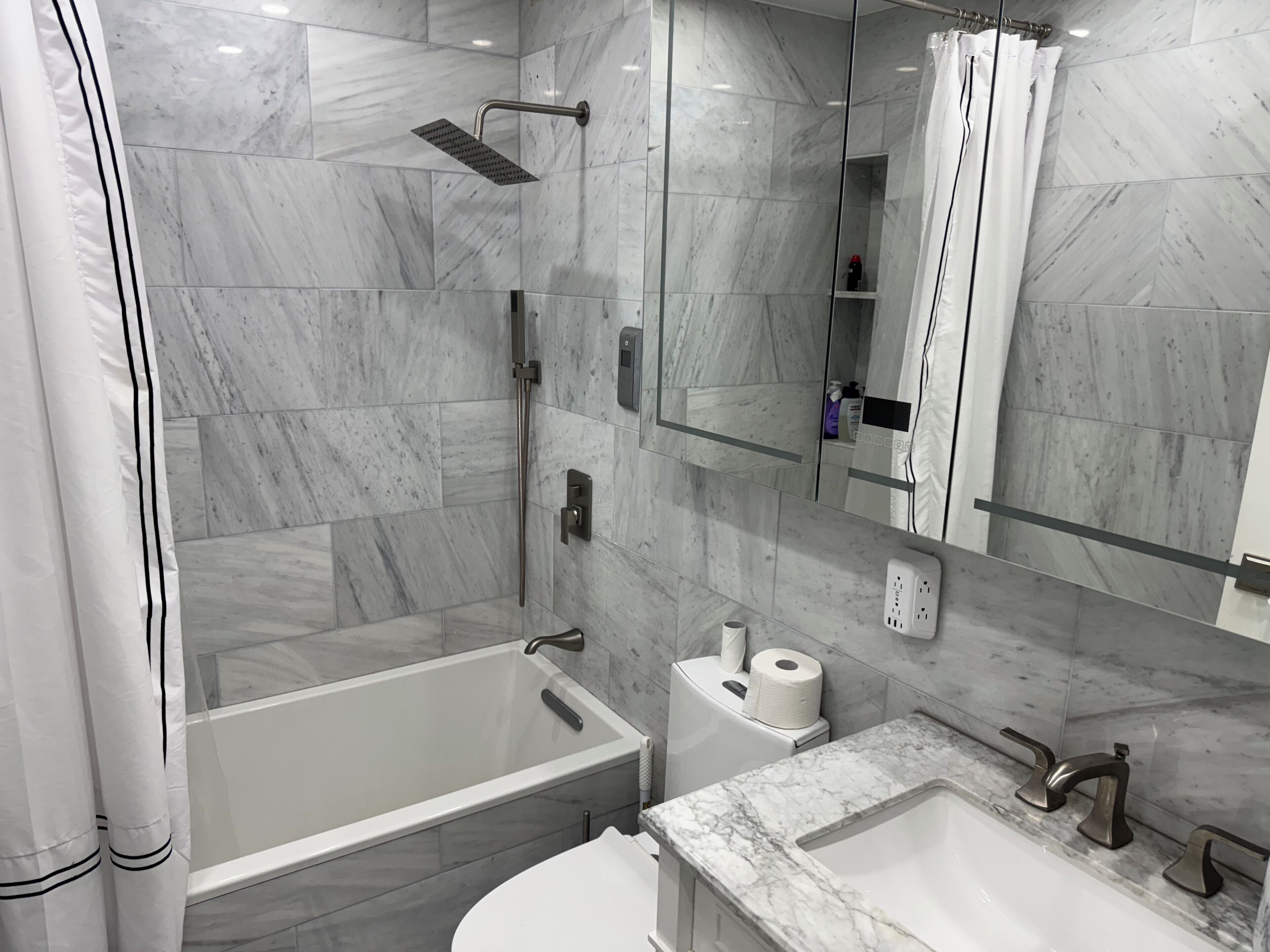 Hair dryer, towels, soap, toilet paper