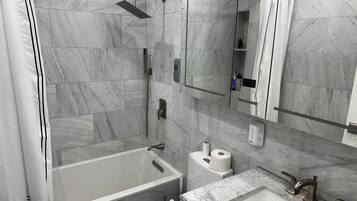 Hair dryer, towels, soap, toilet paper
