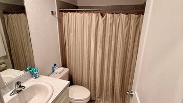 Shower, towels, soap, shampoo