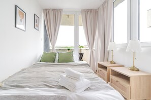 Fer et planche à repasser, draps fournis