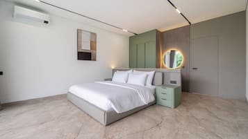 Executive villa, uitzicht op zwembad | Lakens van Egyptisch katoen, luxe beddengoed, een kluis op de kamer