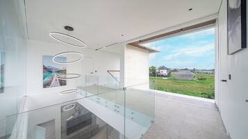 Executive villa, uitzicht op zwembad | Interieur