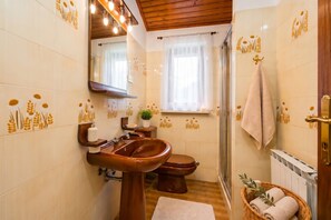 A bathroom with a sink, toilet, and shower. - Marisa Olive Grove - App Sole, Labin, Croatia (Labin)