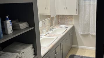 Hair dryer, towels, soap, shampoo