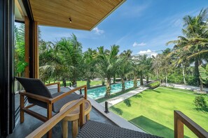Villa Signature - utsikt mot poolen | Boendeområde
