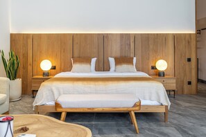 Signature villa, uitzicht op zwembad | Lakens van Egyptisch katoen, luxe beddengoed, een kluis op de kamer