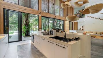 Signature Villa, Pool View | Private kitchen | Electric kettle, spices, eco-friendly cleaning products, paper towels