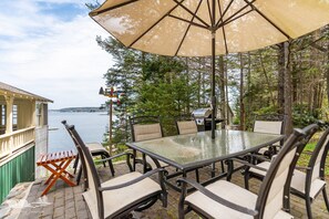 Outdoor dining - Pinecroft: Spacious Southport Getaway with Association Dock Access, Patio & Mooring Available (Southport)